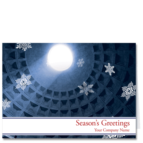 These corporate holiday cards for business depict a skyward look up to the oculus of the Pantheon in Rome in hues of indigo blue. Floating snowflakes accent your choice of holiday sentiment and your company name on the lower edge of the card.