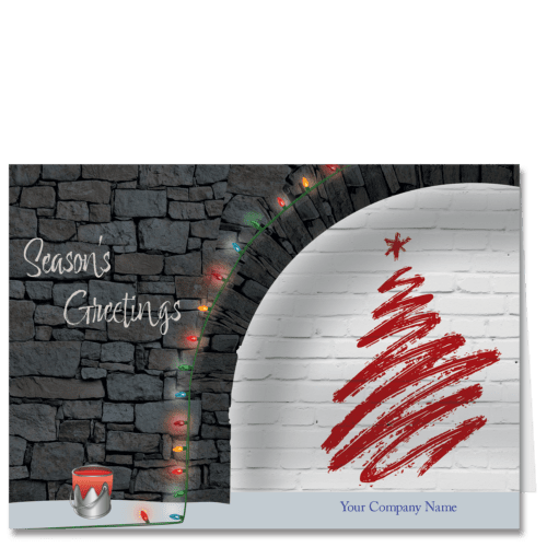 This business Christmas card features a scribbled painting on a white brick wall in the style of the street artist Banksy. Your company name is included on the card front.