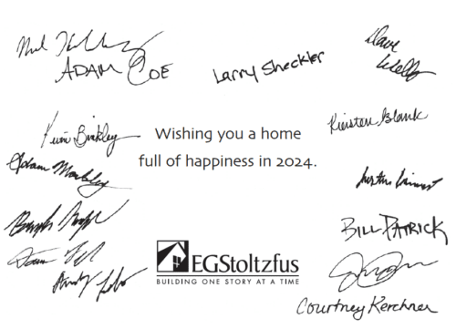 Business Christmas cards with printed signatures in black ink with a company logo below the holiday greeting.