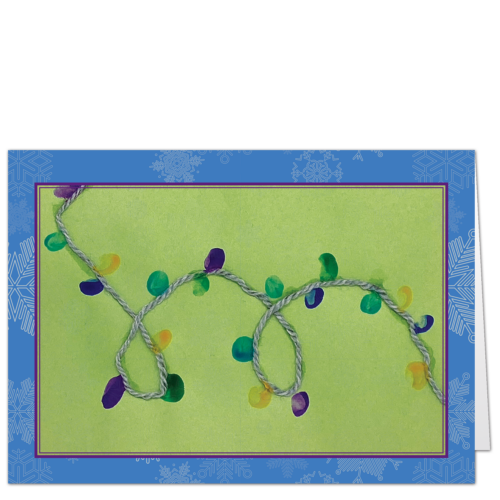 Charity Christmas card with a strand of lights made of purple and green fingerprints agains a pea green background.